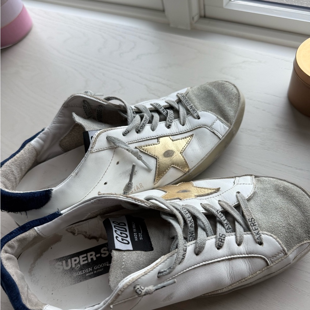 Golden Goose White and Gold Sneakers (blue backing)